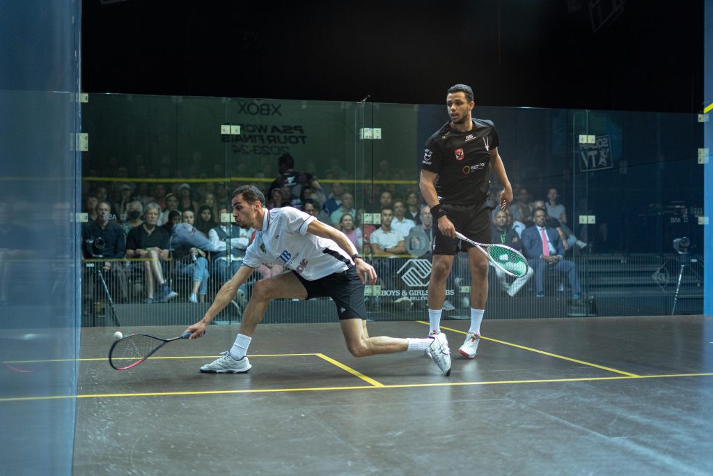 Ali Farag (left) takes on Mostafa Asal